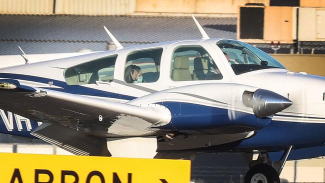 Anna Coffey lands in Melbourne aboard the Angel Flight. Picture: David Caird