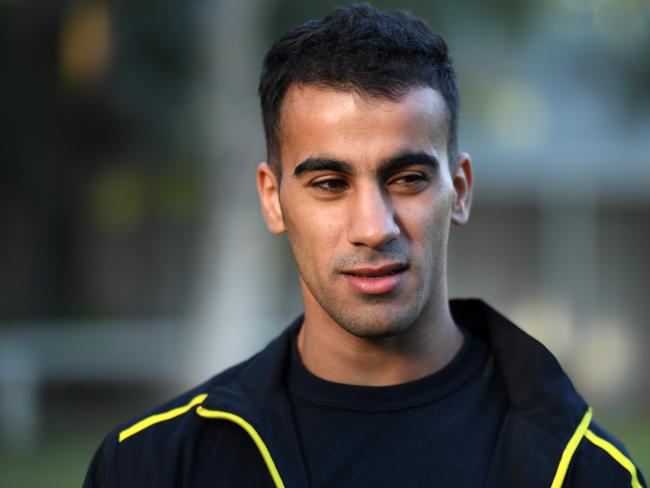 Footballer and refugee Hakeem Al Araibi at a friendly soccer match at the playing fields at Parliament House in Canberra, Thursday, February 14, 2019. (AAP Image/Mick Tsikas) NO ARCHIVING