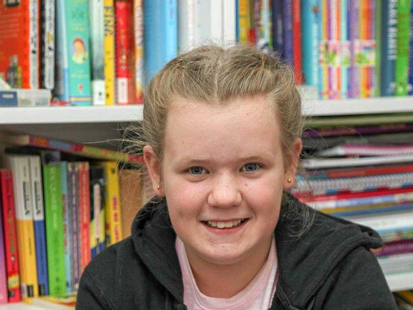GOOD READING: Makayla Osborne is encouraging her fellow students to register for the MS Readathon. It promotes literacy and raises money for people like her mum Leah, who has multiple sclerosis.