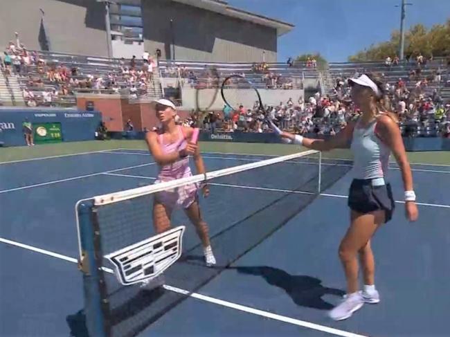 Ukraine’s_Marta_Kostyuk_ (L) refused to shake hands with Victoria Azarenka after the match.