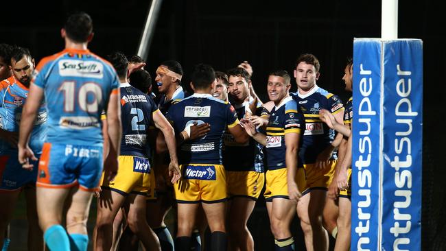 Norths Devils players celebrate scoring against Pride. PICTURE: BRENDAN RADKE