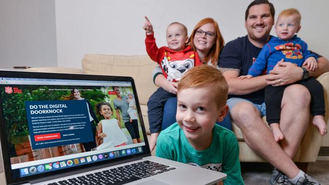 Salvation Army officers Nathan and Kylie Hodges with their sons Caleb, 6, Jackson, 3, and Judah, 1, are encouraging South Australians to donate to the online Red Shield Appeal. Picture: Brenton Edwards