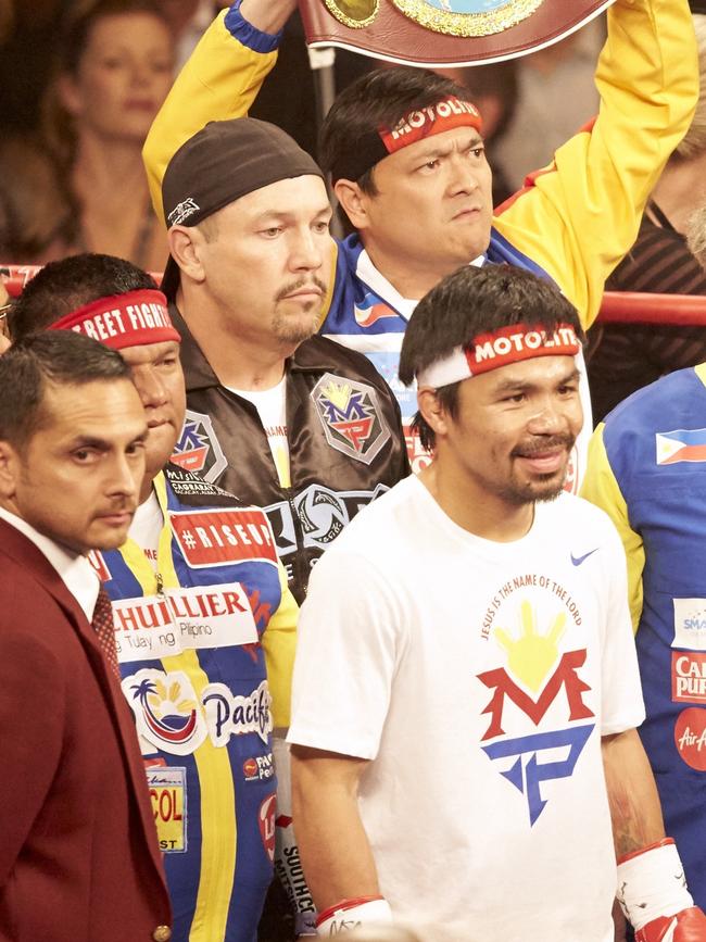Fortune (backwards hat) and Pacquiao ahead of the Mayweather blockbuster. Picture: Simon Bruty /Sports Illustrated via Getty Images