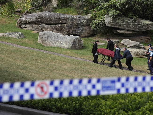 Police and morticians transport away the body of Paul Thijssen, found at the base of cliffs at Diamond Bay, Vaucluse, after he killed Lili James. Picture: NCA NewsWire / Max Mason-Hubers