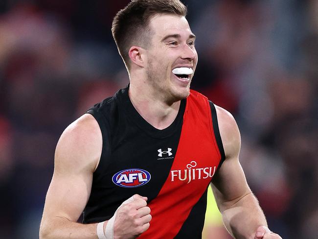 MELBOURNE, AUGUST 4, 2024: 2024 AFL Football - Round 21 - Essendon Bombers V Fremantle Dockers at the MCG. Zach Merrett of the Bombers celebrates the win. Picture: Mark Stewart