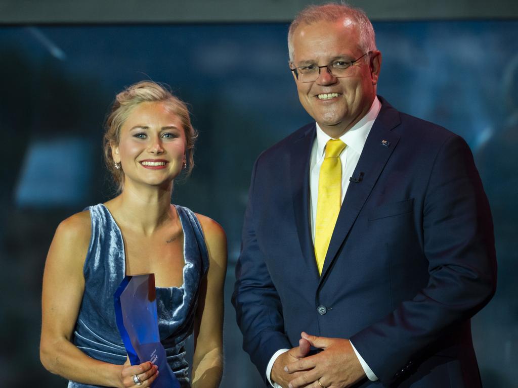 It was this photograph of Prime Minister Scott Morrison with Australian of the Year winner Grace Tame that hardened Brittany Higgins’ resolve to speak. Picture: NCA NewsWire/Martin Ollman