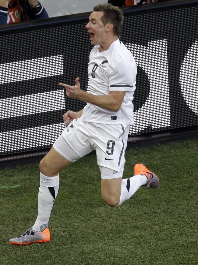 Shane Smeltz jumps for joy after scoring for New Zealand against Italy at the 2010 World Cup (AP Photo/Michael Sohn)