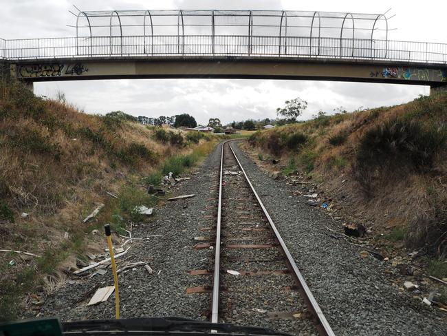 There has been a high number of recent incidents where rubbish, including prams and pavers, have been thrown onto the rail from bridges. Picture: SUPPLIED