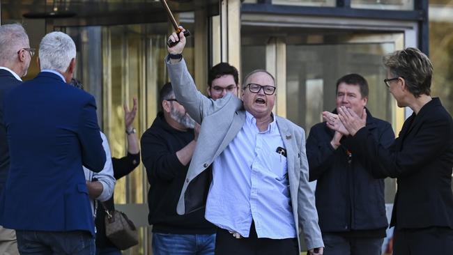 Jubilation after the High Court verdict: TWU national secretary Michael Kaine, centre, and ACTU secretary Sally McManus, right. Picture: NCA NewsWire / Martin Ollman