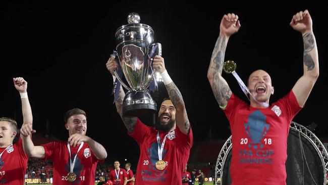 Paul Izzo celebrates with the FFA Cup trophy earlier this year. Picture Sarah Reed