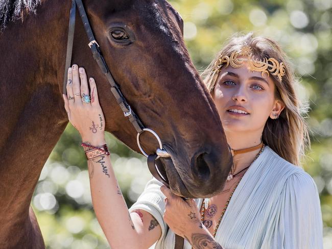 Paris Jackson ... if you are an international guest at the Melbourne Cup, make sure you have your photo taken with a horse. Picture: Jason Edwards