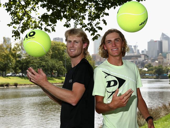 Luke Saville of Australia and Max Purcell of Australia pose for photos ahead of their men's doubles final during day 12 of the Australian Open tennis tournament in Melbourne, Friday, January 31, 2020. (AAP Image/Rob Prezioso) NO ARCHIVING, EDITORIAL USE ONLY