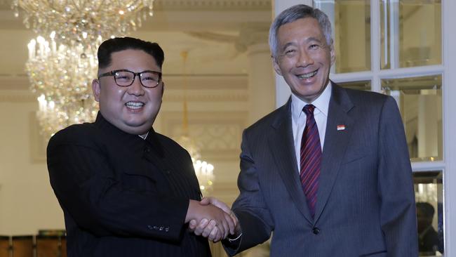 Kim Jong-un with Singaporean Prime Minister Lee Hsien Loong. Picture: AP