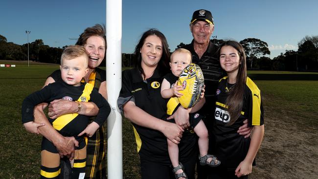 Richmond footballer Jack Graham’s grandparents Trevor, 77, and Jan Graham, 74, and Jack’s sisters Keeley, 11 and Jennifer Graham, 26, and Jennifer’s sons, Hudson, 2, and Chase, 14 months, pictured at the Pertaringa Oval where Jack learned to play footy at Tea Tree Gully Football Club. Picture: Dylan Coker