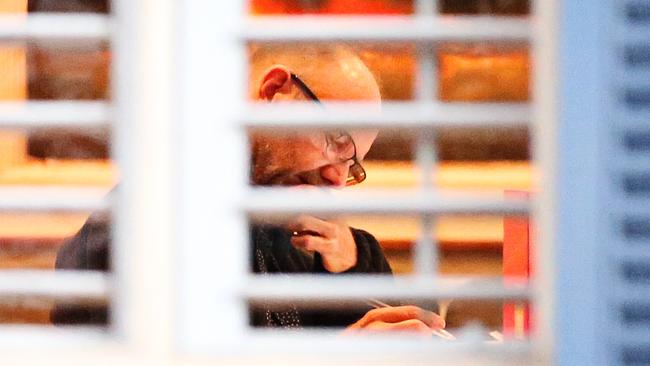 Pen in hand, former 60 Minutes senior producer Stephen Rice sits to write at his home in Birchgrove last night. Picture: Adam Yip