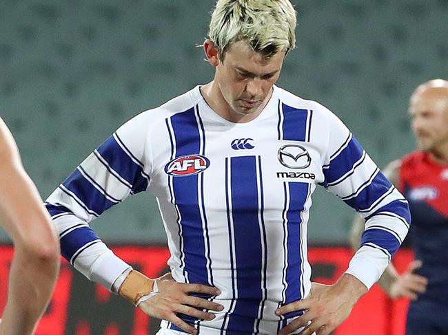 AFL - Sunday, 9th August, 2020 - Melbourne v North Melbourne at the Adelaide Oval. Kangaroos players after the loss - Jasper Pittard (centre) Picture: Sarah Reed