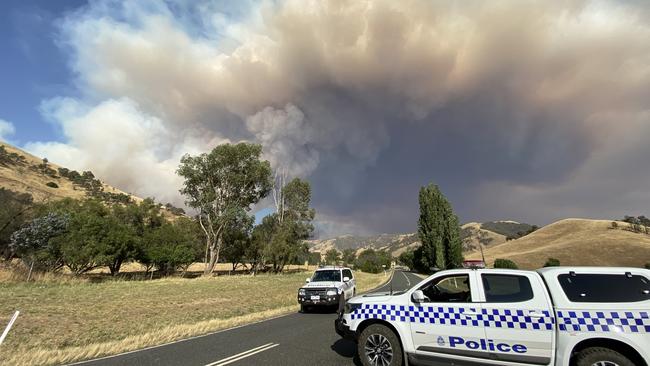 Smoke billows over the outskirts of Walwa across the Victorian border as the Green Valley fire threatens nearby towns. Picture: Supplied