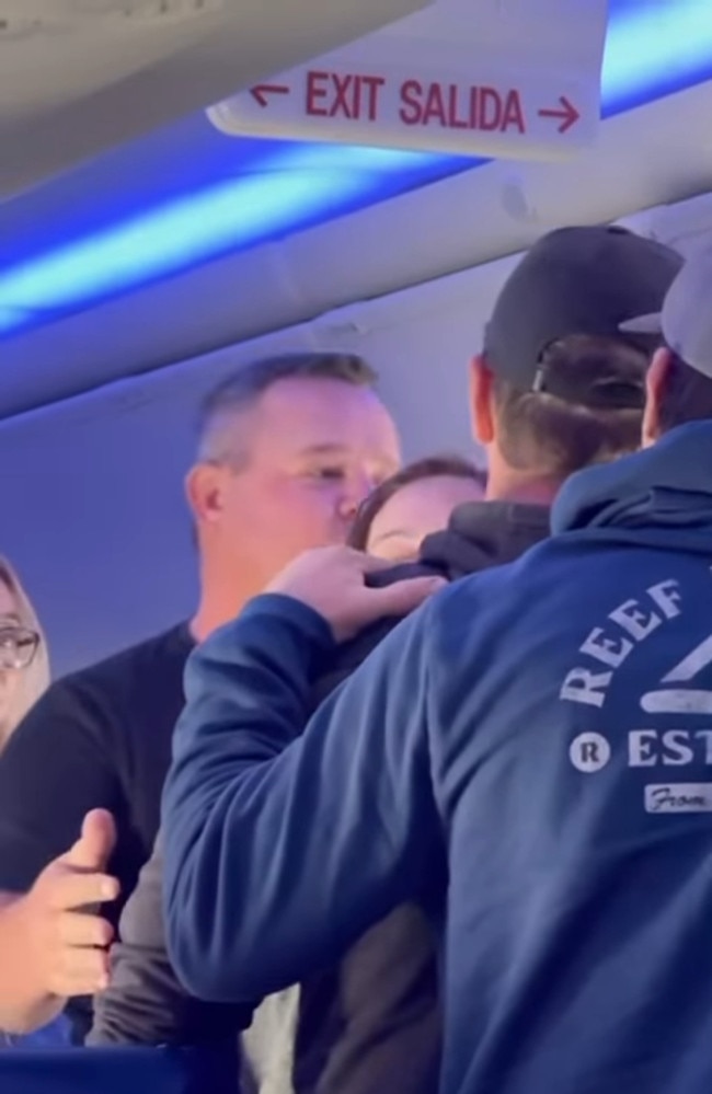 Passengers and crew intervened, breaking up the fight. Picture: @kauai.airbnb via Storyful