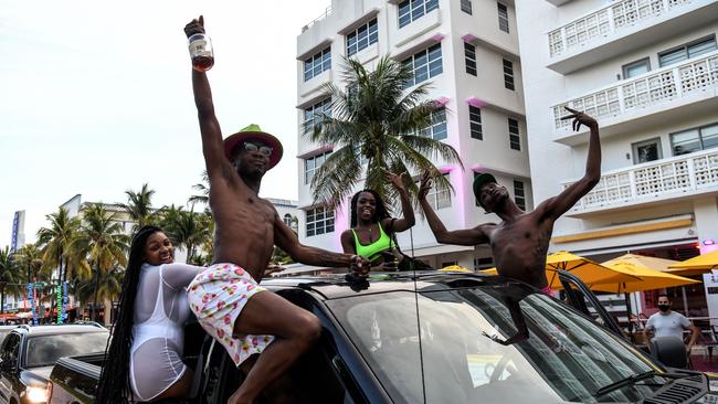 Revellers on Ocean Drive in Miami Beach, Florida on July 14.