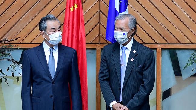 Secretary-General of the Pacific Islands Forum Henry Puna, right, and Chinese Foreign Minister Wang Yi in Suva. Picture: AFP