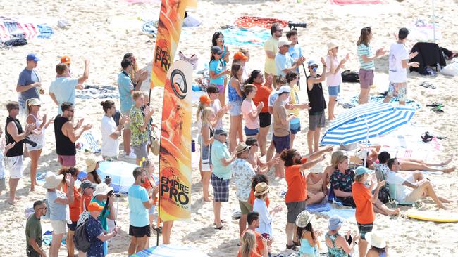 Extras take their place on Miami Beach for the filming of TV show Reef Break. Picture Glenn Hampson