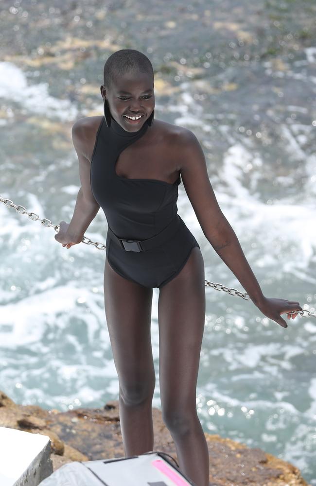 Adut Akech at Bondi Icebergs shooting for British Vogue.