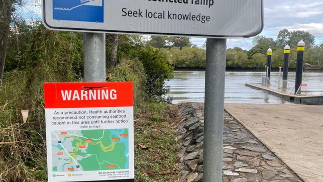 Health Authorities erected new signs this week warning people fishing on the Logan River that any seafood catch could be contaminated after a sewage spill further up the river.