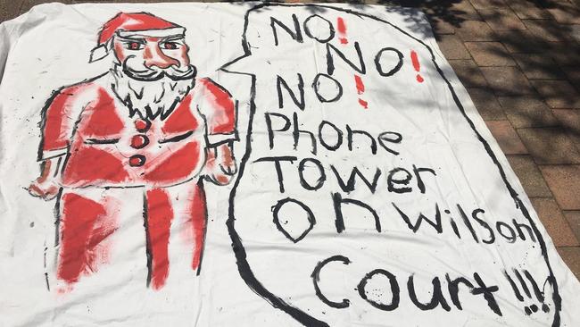 A protest sign against the Telstra tower proposed to be built at Grange.