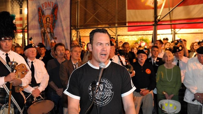McCall presents his poem A Firefighter's Dream at Ground Zero, New York, in 2010.