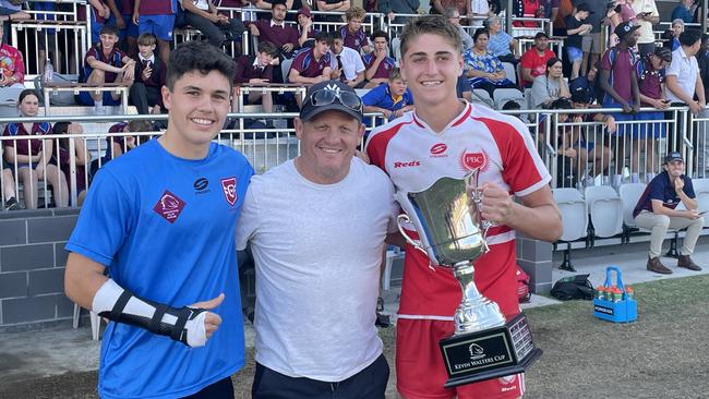 Palm Beach Currumbin players Marley McLaren, left, and Taj lateo with Broncos legend and coach Kevin Walters after the school won the Walters Cup in September.