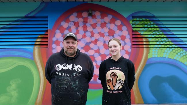 Indigenous artist Scott Rathman and Ashalea Perry with the mural. Picture: Playford Council