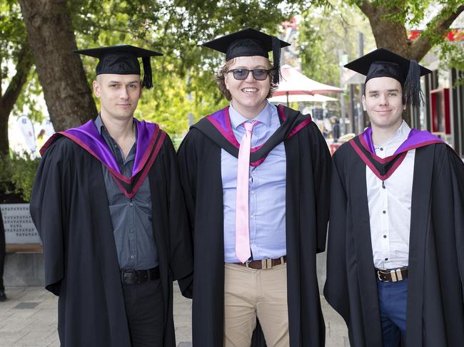 Neil Rothwell, Ben Lister and Dylan Barnett at the UTAS Graduation at Launceston. PICTURE CHRIS KIDD