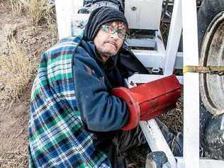 A protester locked to a drill rig at Adani's Carmichael mine site. Picture: Frontline Action on Coal