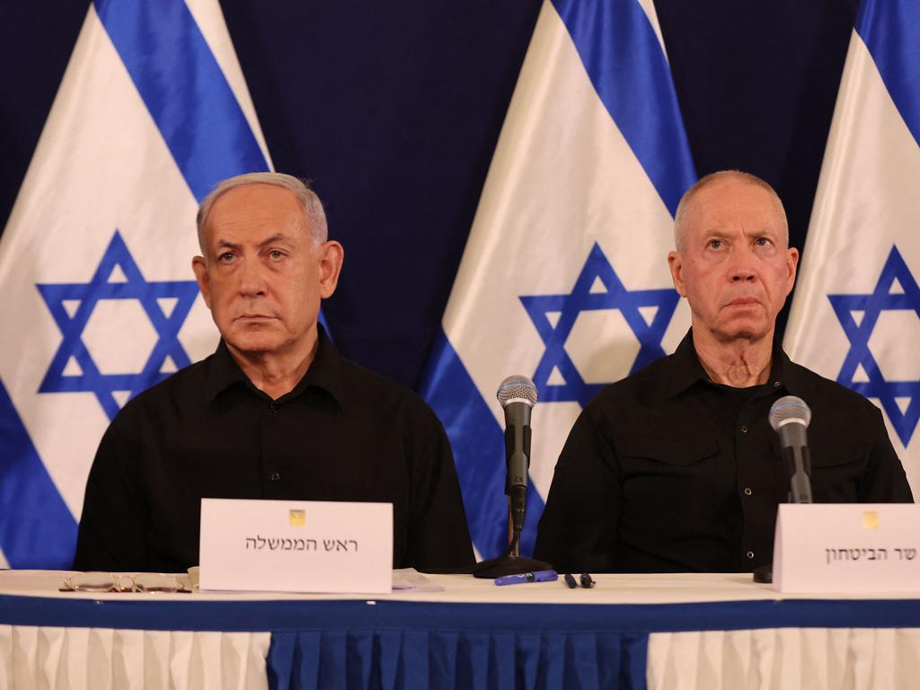 (FILES) Israeli Prime Minister Benjamin Netanyahu (L) and Defence Minister Yoav Gallant attend a press conference in the Kirya military base in Tel Aviv on October 28, 2023 amid ongoing battles between Israel and the Palestinian group Hamas. Israel's Prime Minister Benjamin Netanyahu on November 5, 2024, dismissed Defence Minister Yoav Gallant over a breakdown in trust during the Gaza war against Hamas, his office said. (Photo by Abir SULTAN / POOL / AFP)