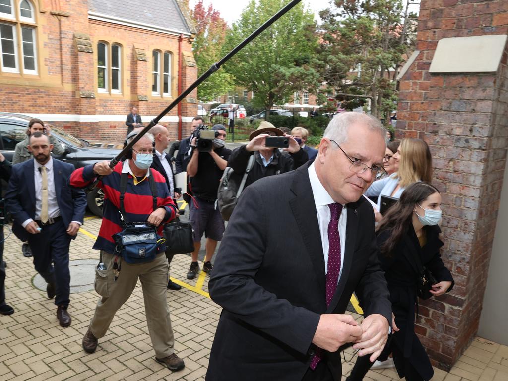 Mr Morrison was ushered into the building past the protest. Picture: Jason Edwards