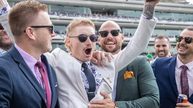 2022 Lexus Melbourne Cup at Flemington Racecourse. Some punters have a win. Picture: Jason Edwards