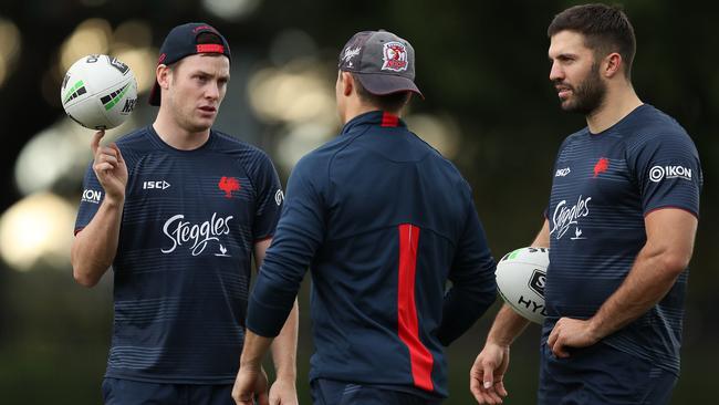 Cronk plotting with Luke Keary and James Tedesco. Photo: Brett Costello