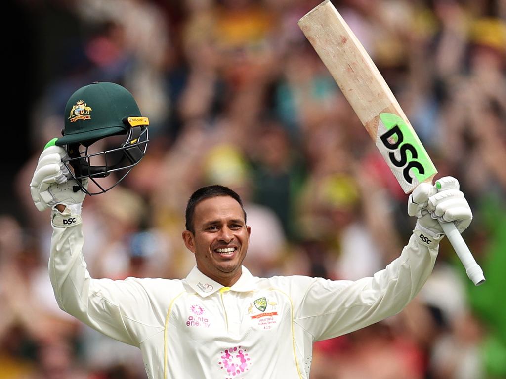 Usman Khawaja celebrates his ton on his Test return.