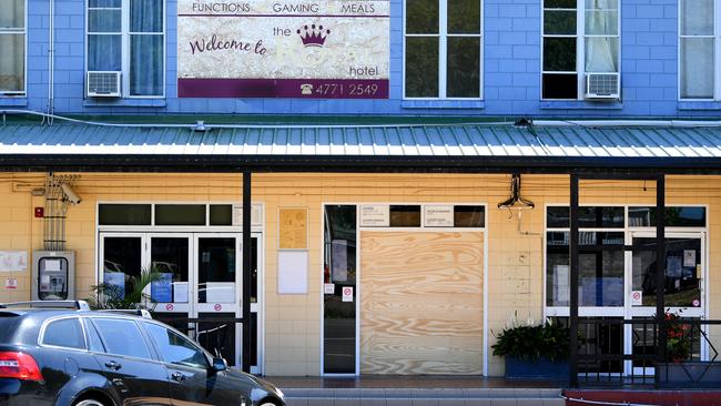 Smashed doors were patched up with timber at the Royal Hotel on Stagpole St, West End. Picture: Alix Sweeney