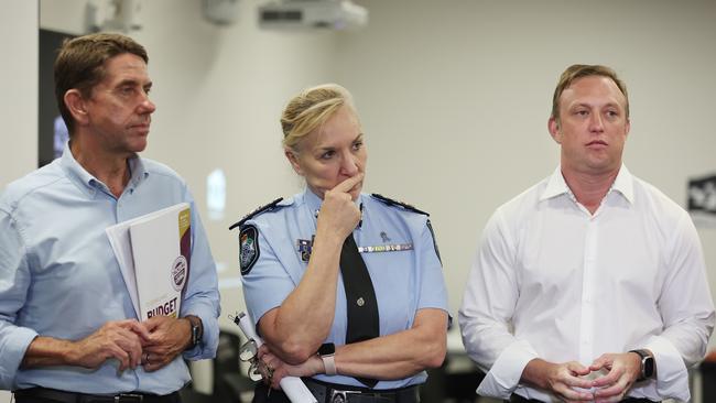 Steven Miles, right, at Townsville Disaster Emergency Centre with Cameron Dick, left, and Police Commissioner Katarina Carroll.