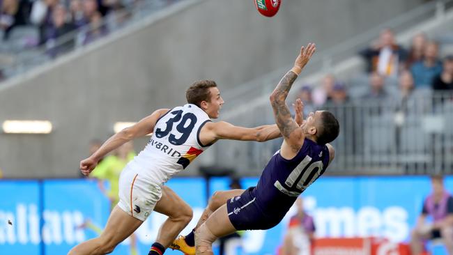 Tom Doedee attempts to spoil Michael Walters. Picture: AAP