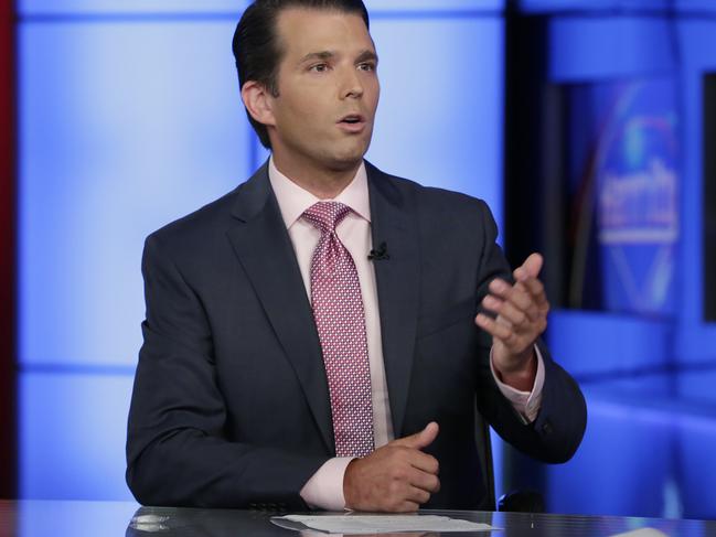 Donald Trump Jr. is interviewed by host Sean Hannity on his Fox News Channel television program, in New York Tuesday, July 11, 2017. Donald Trump Jr. has long been his father's id, the brawler who has helped fuel the president's pugilistic instincts and stood firm as one of his fiercest defenders. Now the president's eldest son is at the center of the firestorm over Russian connections swirling around his father's administration and trying to fight off charges that he was open to colluding with Moscow to defeat Hillary Clinton. (AP Photo/Richard Drew)