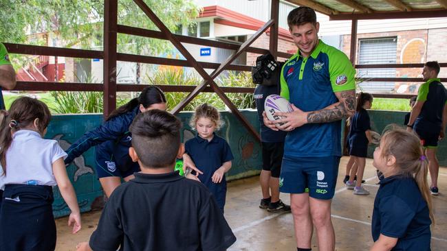 Curtis Scott on the south coast at Mogo Primary School which has been heavily affected by the bushfires. Picture: Canberra Raiders