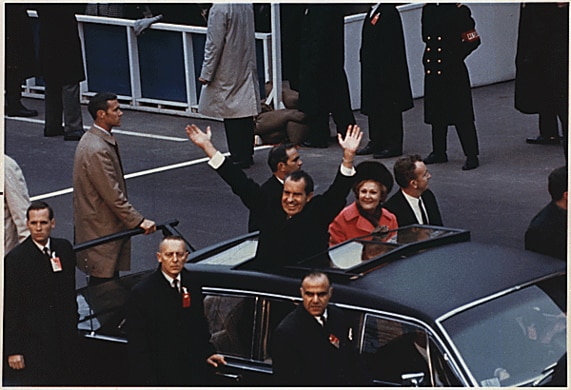 Newly inaugurated President Richard Nixon and his wife, First Lady Pat Nixon, wave from their limousine during the 1969 inaugural parade. Picture: Wikipedia