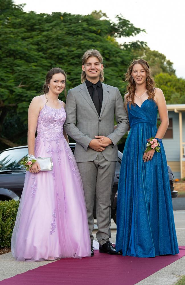 Megan Chatfield, Lila Mamet, and P.J. Hill, graduating class of 2023, arrive at St Patrick’s Formal on Friday, May 5, 2023. Gympie, Queensland. Picture: Christine Schindler