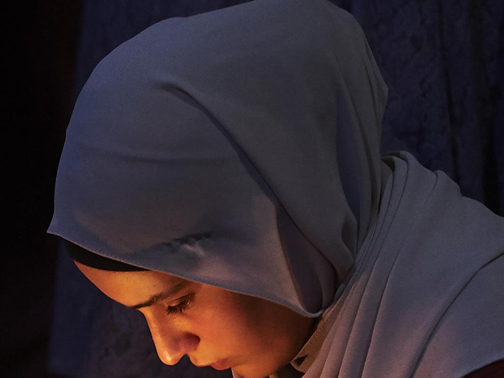 Mourners at a candlelight prayer in Melbourne. Picture: Jaimi Chisholm/Getty Images