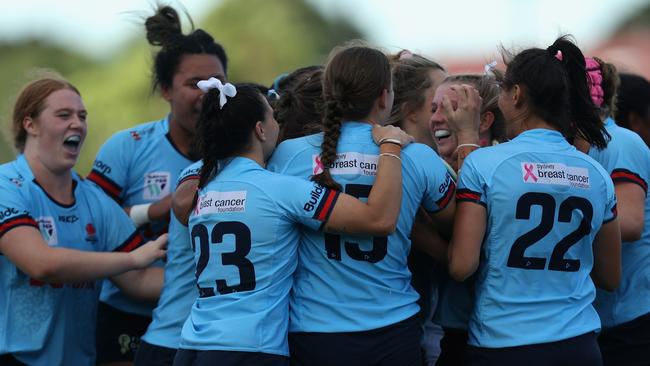 SYDNEY, AUSTRALIA - APRIL 08: The NSW Waratahs celebrate after scoring a try during the Super W match between NSW Waratahs Women and Fijian Drua at Concord Oval, on April 08, 2023, in Sydney, Australia. (Photo by Tim Allsop/Getty Images)