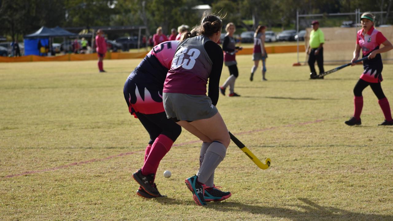 Heather French in possession for Gladstone at the 2021 Queensland Hockey Women's Masters Championships.