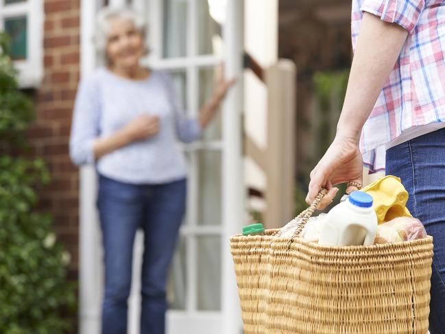 Person Doing Shopping For Elderly Neighbour