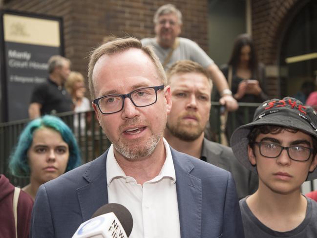 David Shoebridge speaks to the media outside Manly Court with climate emergency protesters at Manly on Thursday, 16 January, 2020. Picture: AAP IMAGE / Troy Snook